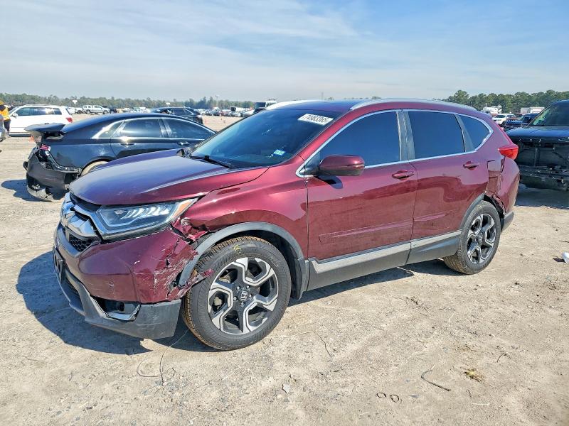HONDA CR-V 2018 with VIN 7FARW1H90JE004295 - Photo from auction