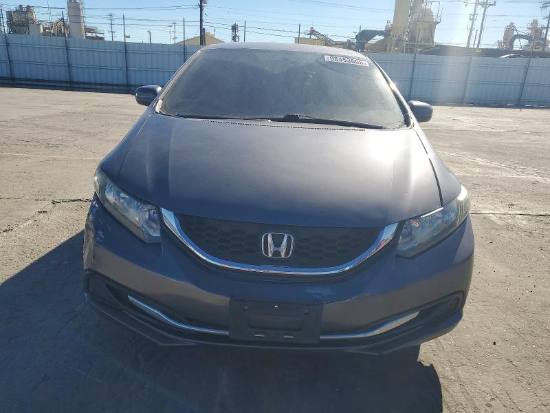 Photo 5 from auction – 2014 HONDA CIVIC LX with VIN 19XFB2F50EE058109
