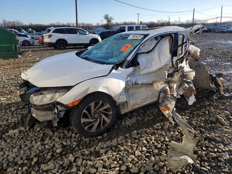 HONDA CIVIC 2018 with VIN 19XFC2F71JE207104 - Photo from auction
