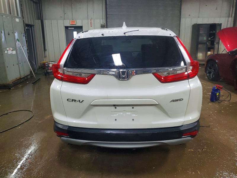Photo 6 from auction – 2018 HONDA CR-V with VIN 5J6RW2H52JL006359