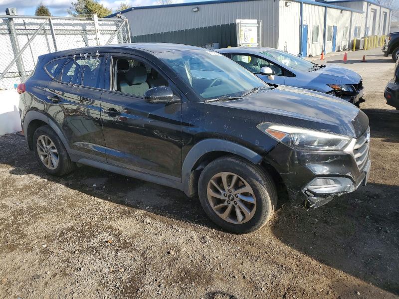 Photo 4 from auction – 2016 HYUNDAI TUCSON SE with VIN KM8J23A43GU084251