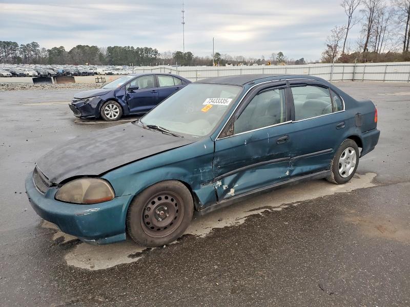 Photo 1 from auction – 1997 HONDA CIVIC LX with VIN 2HGEJ6678VH527007