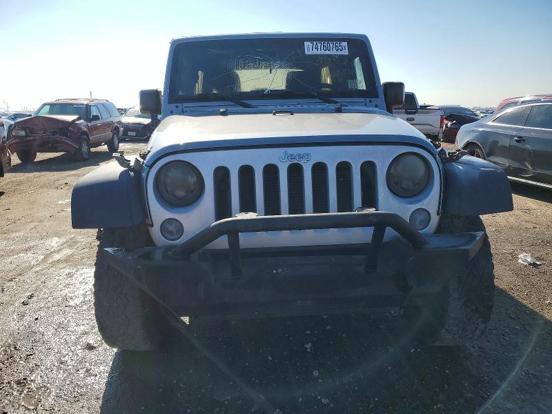 Photo 5 from auction – 2016 JEEP WRANGLER U with VIN 1C4BJWDG2GL145243