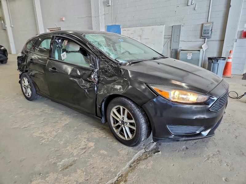 Photo 4 from auction – 2015 FORD FOCUS with VIN 1FADP3K21FL270655