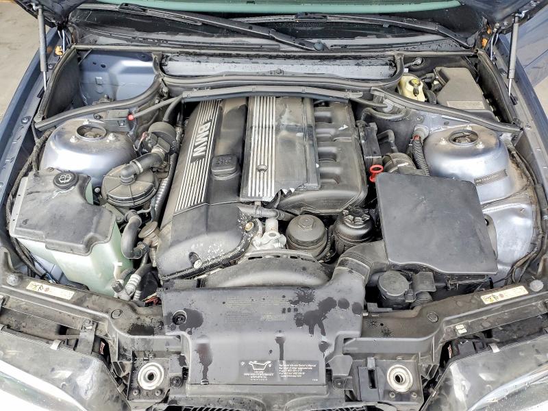 Photo 11 from auction – 2004 BMW 325 CI with VIN WBABW33404PL29007