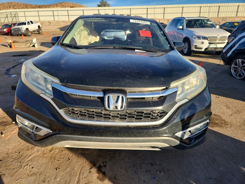 Photo 5 from auction – 2015 HONDA CR-V with VIN 5J6RM4H57FL005927