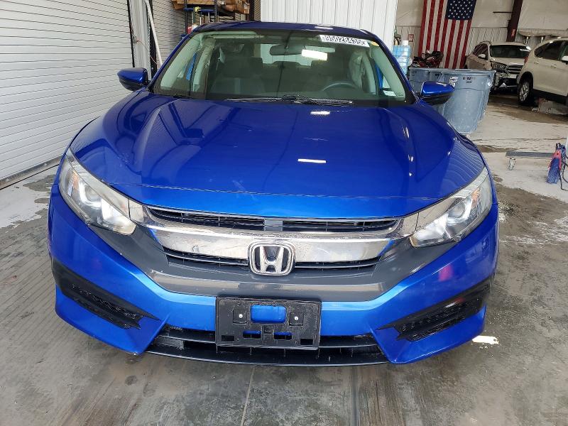 Photo 5 from auction – 2018 HONDA CIVIC LX with VIN 19XFC2F56JE025042