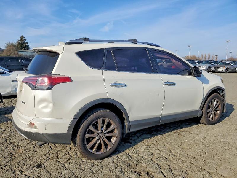 Photo 3 from auction – 2017 TOYOTA RAV4 LIMIT with VIN JTMYFREV8HJ142029