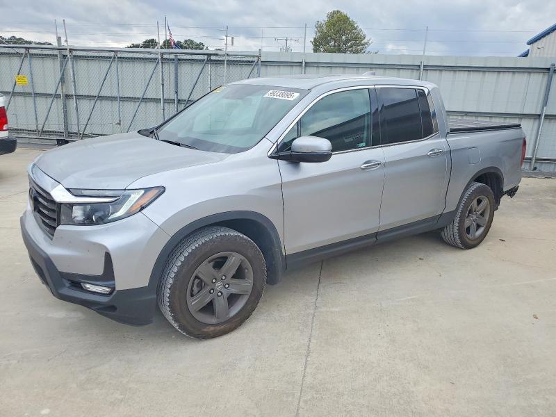 HONDA RIDGELINE 2023 with VIN 5FPYK3F73PB009104 - Photo from auction
