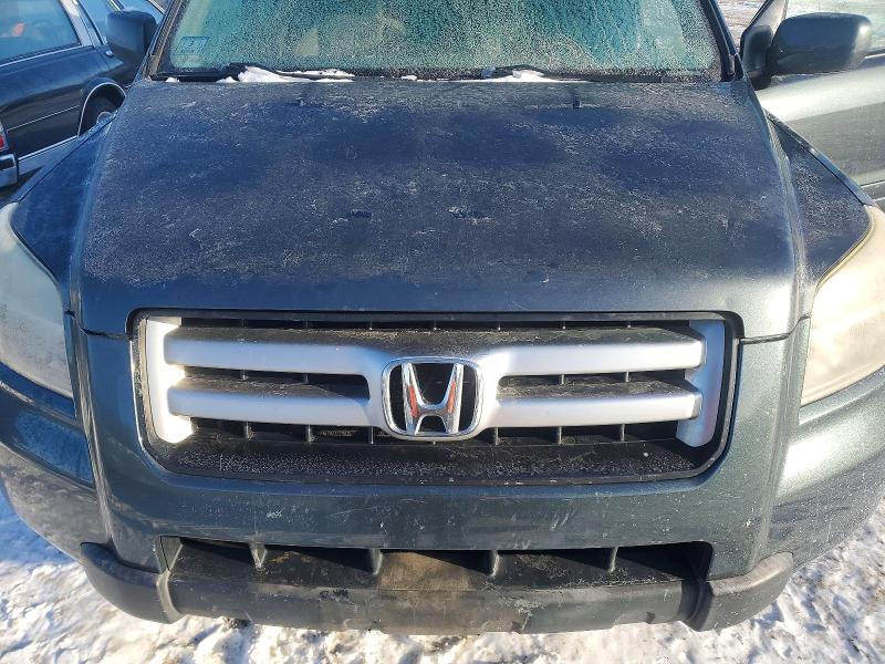 Photo 12 from auction – 2006 HONDA PILOT EX with VIN 2HKYF18486H504628