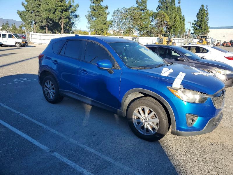 Photo 4 from auction – 2014 MAZDA CX-5 with VIN JM3KE2CY6E0375607