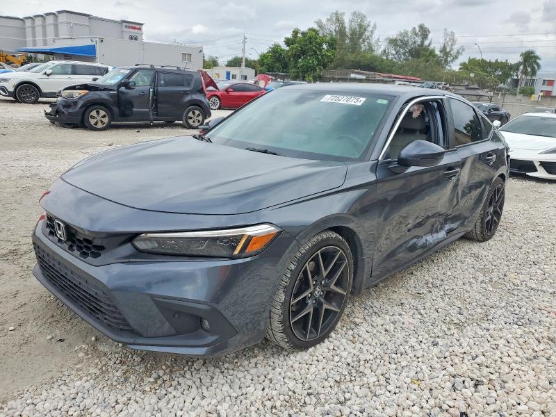 HONDA CIVIC 2023 with VIN 19XFL1H86PE000863 - Photo from auction