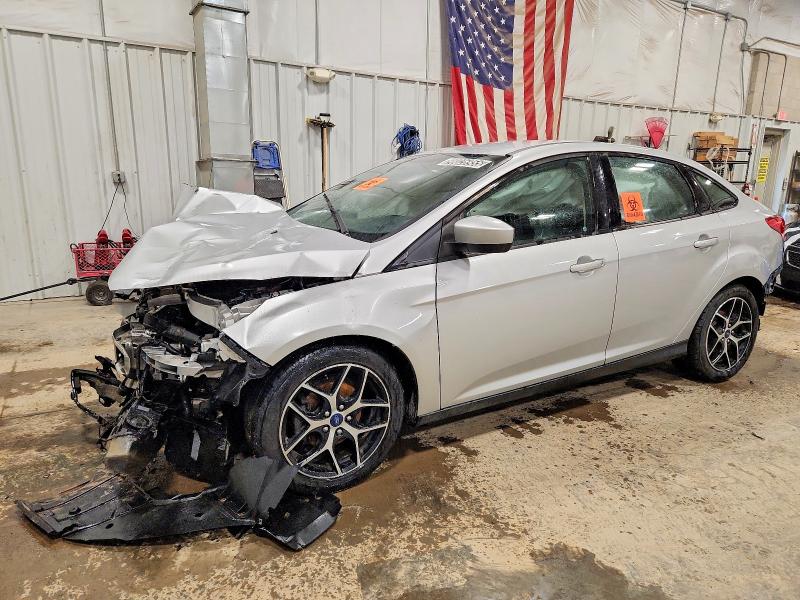 FORD FOCUS SE 2018 with VIN 1FADP3FE0JL201338 - Photo from auction