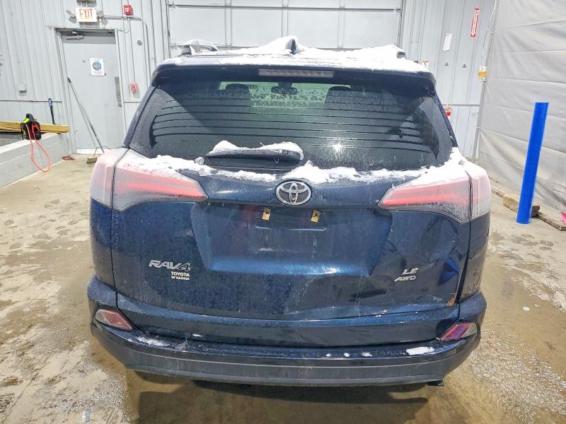 Photo 6 from auction – 2017 TOYOTA RAV4 with VIN JTMBFREV1HJ704021