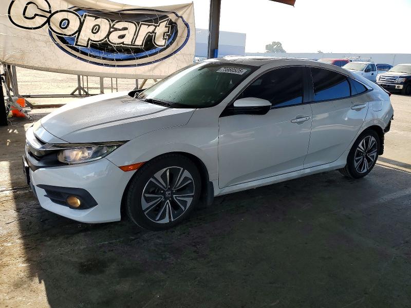 HONDA CIVIC EXL 2017 with VIN 2HGFC1F73HH646086 - Photo from auction