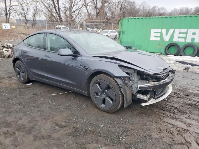 Photo 4 from auction – 2022 TESLA MODEL 3 with VIN 5YJ3E1EB4NF124957