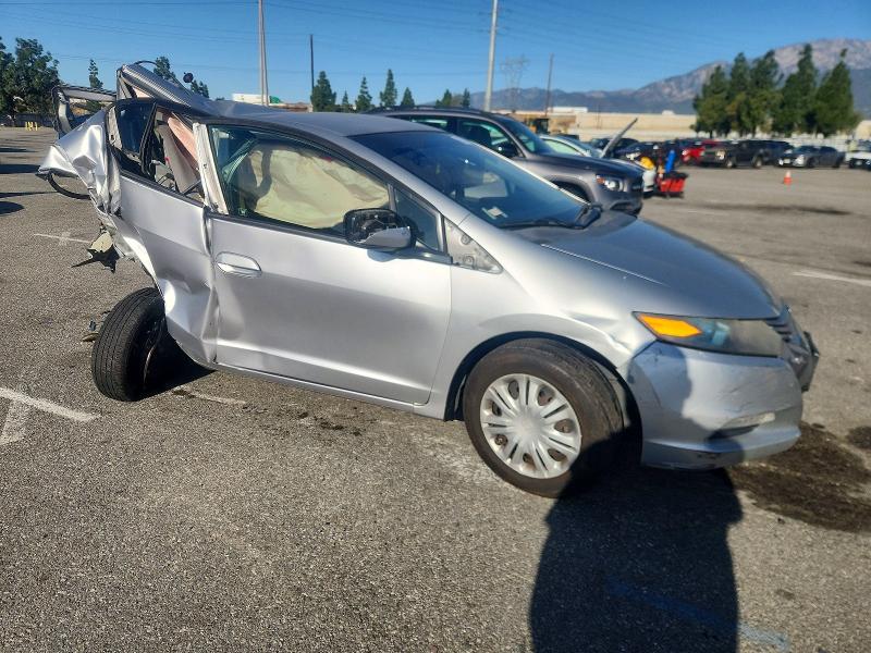 Photo 4 from auction – 2011 HONDA INSIGHT LX with VIN JHMZE2H57BS011491