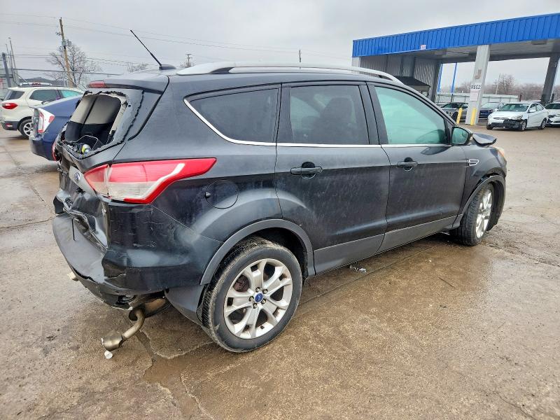 Photo 3 from auction – 2014 FORD ESCAPE with VIN 1FMCU9J95EUB28037