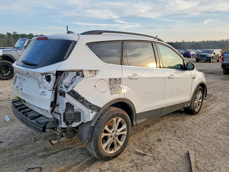 Photo 3 from auction – 2017 FORD ESCAPE SE with VIN 1FMCU0GD9HUC72007