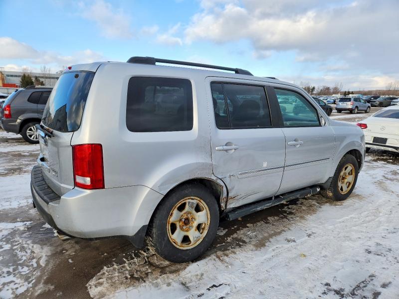 Photo 3 from auction – 2010 HONDA PILOT TOUR with VIN 5FNYF4H97AB502860