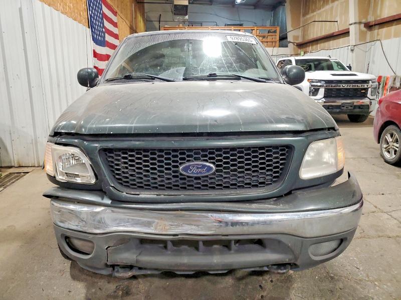 Photo 5 from auction – 2002 FORD F150 with VIN 2FTPX18L22CA87555