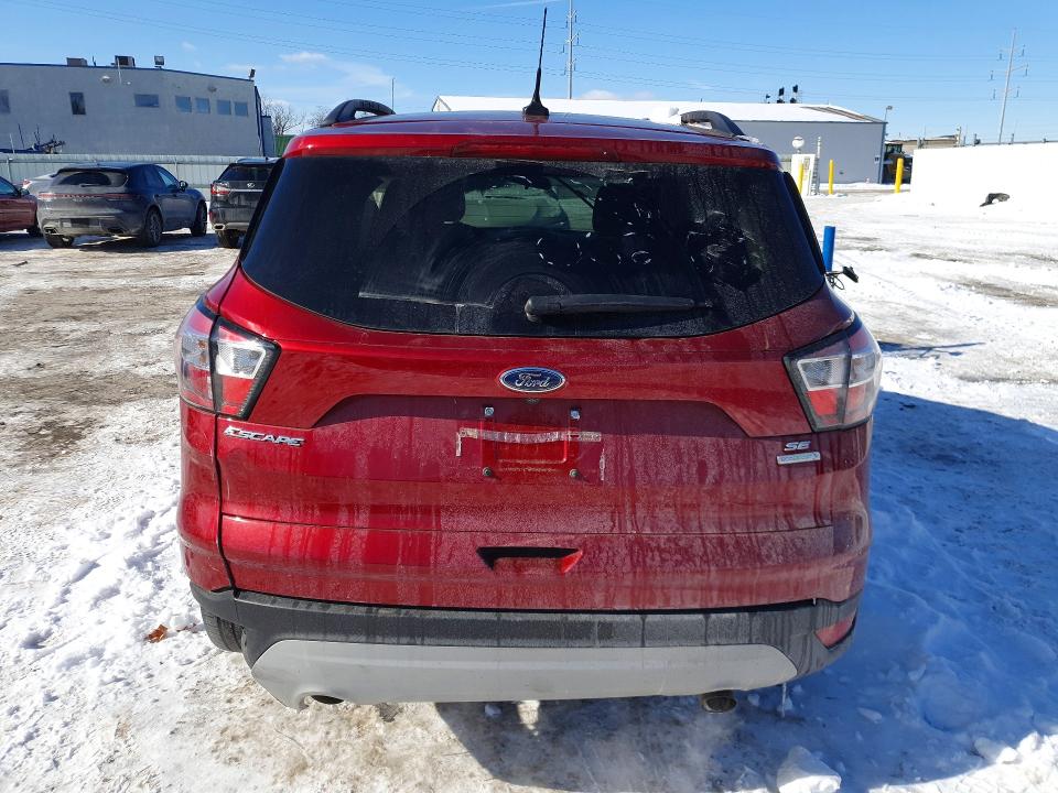 Photo 6 from auction – 2018 FORD ESCAPE with VIN 1FMCU0GD7JUD03258