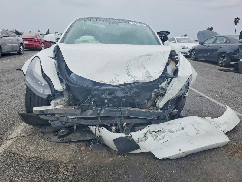 Photo 5 from auction – 2021 TESLA MODEL 3 with VIN 5YJ3E1EC4MF935939