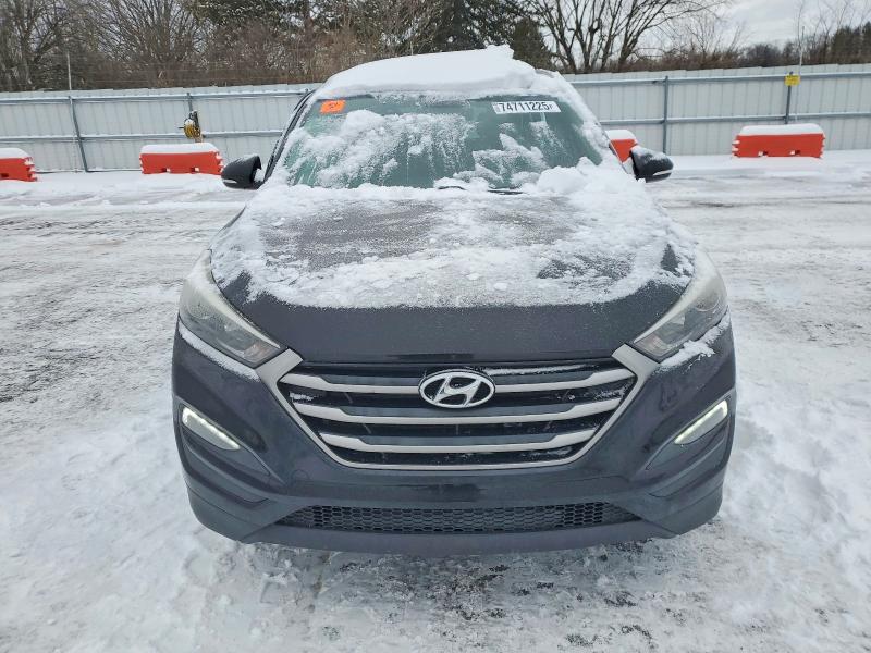 Photo 5 from auction – 2018 HYUNDAI TUCSON with VIN KM8J3CA49JU709448