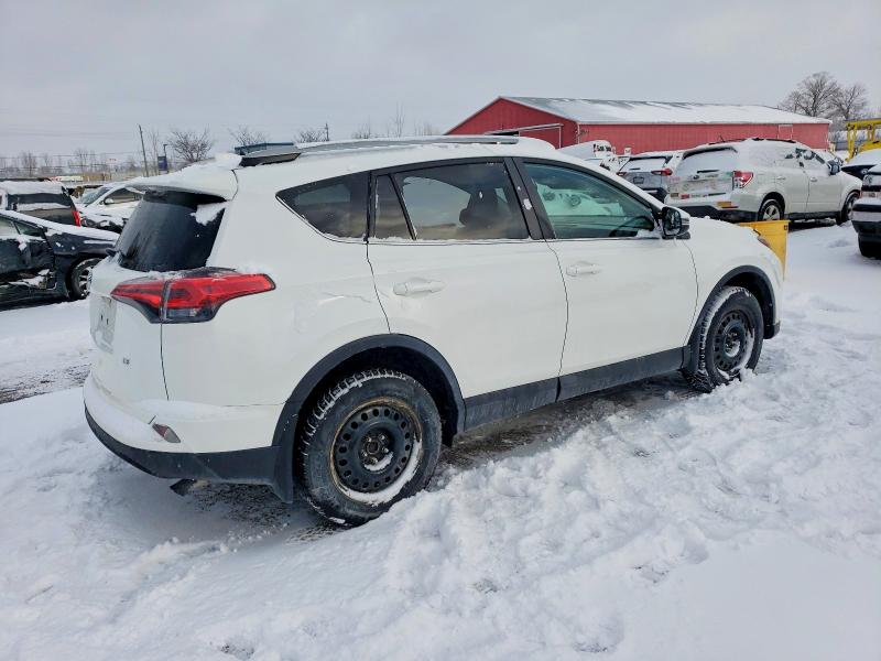 Photo 3 from auction – 2018 TOYOTA RAV4 LE with VIN 2T3ZFREV2JW507459