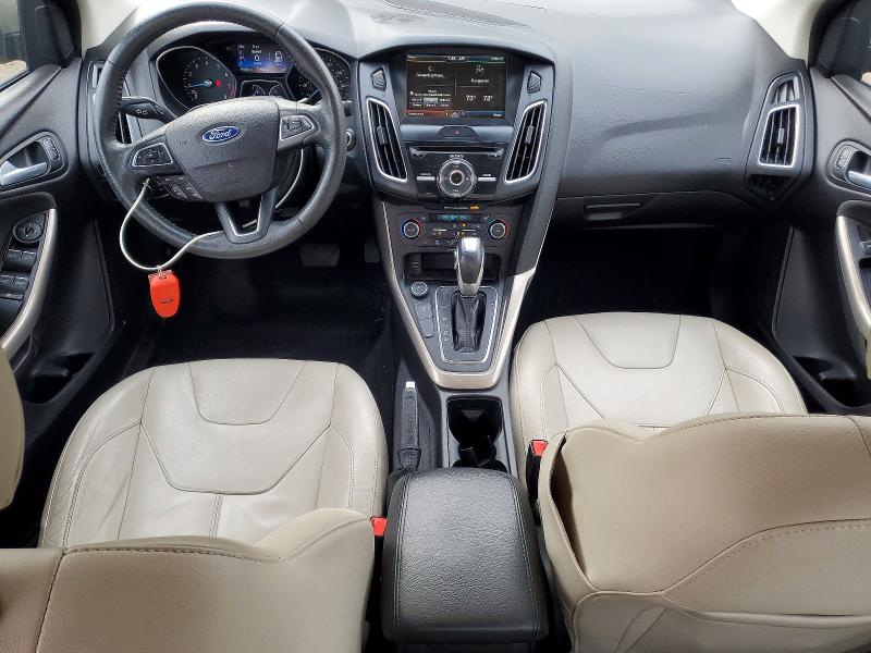 Photo 8 from auction – 2015 FORD FOCUS with VIN 1FADP3J29FL227098