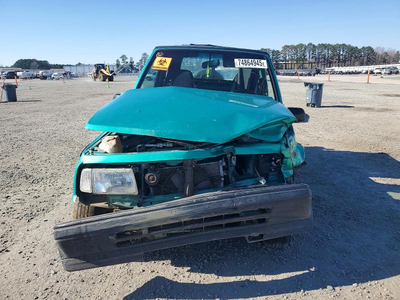 Photo 5 from auction – 1995 GEO TRACKER with VIN 2CNBE18U1S6926999
