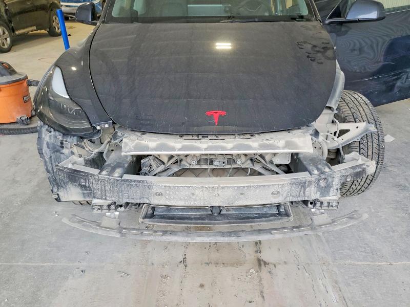 Photo 11 from auction – 2023 TESLA MODEL Y with VIN 7SAYGDEE6PA183460