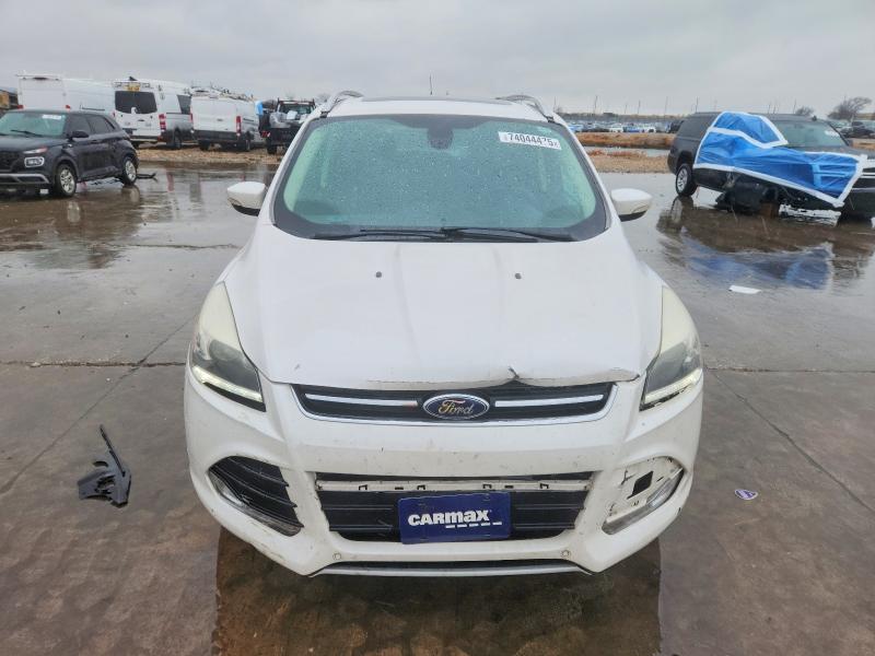 Photo 5 from auction – 2015 FORD ESCAPE TIT with VIN 1FMCU0J91FUB00023