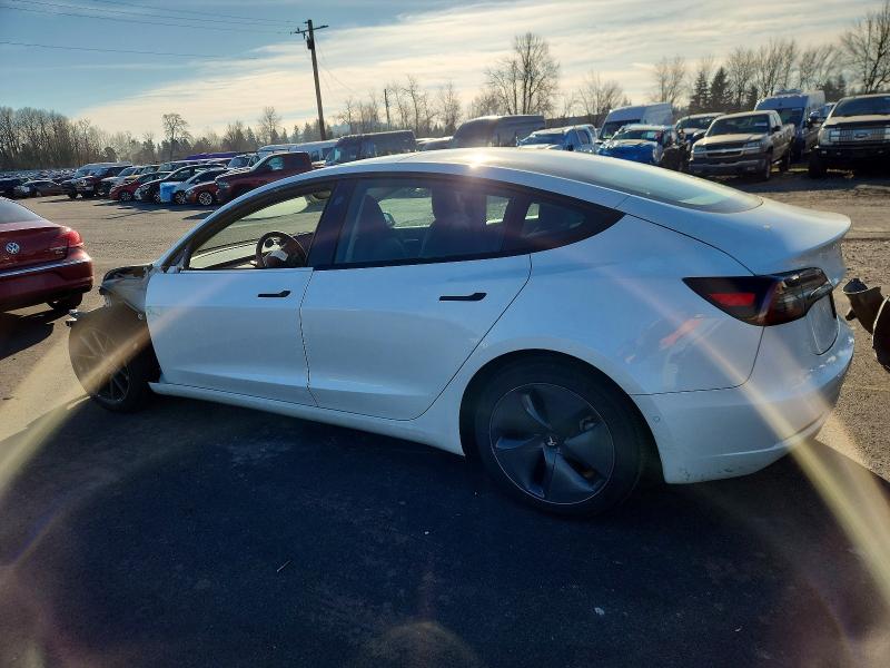 Photo 2 from auction – 2021 TESLA MODEL 3 with VIN 5YJ3E1EA6MF098464