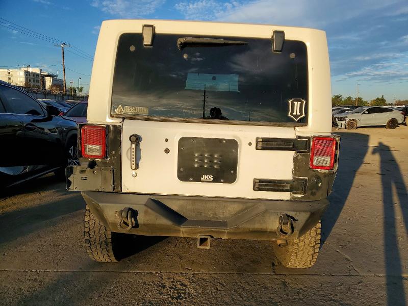 Photo 6 from auction – 2011 JEEP WRANGLER S with VIN 1J4AA2D16BL536673