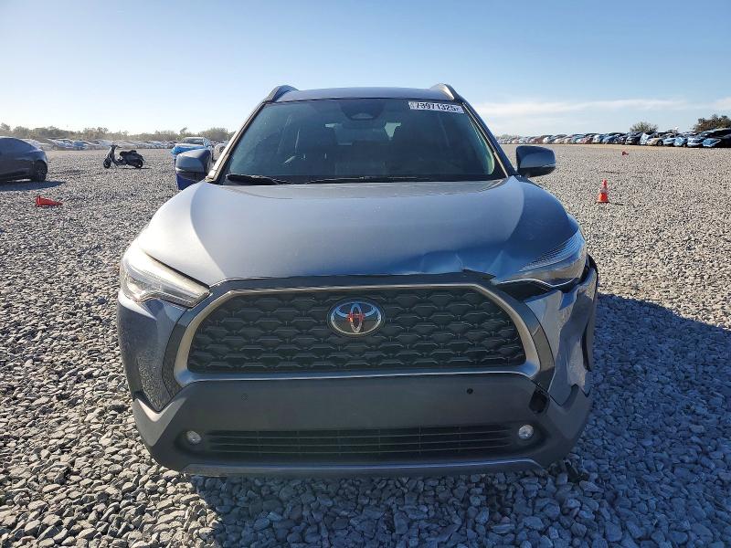 Photo 5 from auction – 2023 TOYOTA COROLLA CR with VIN 7MUDAAAG4PV047285