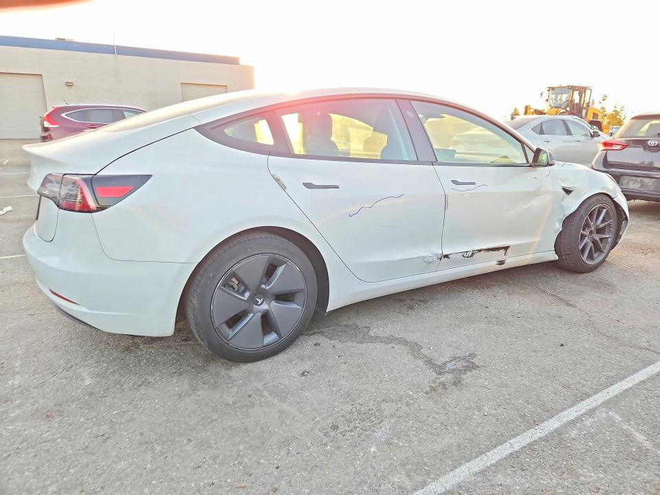 Photo 3 from auction – 2023 TESLA MODEL 3 with VIN 5YJ3E1EAXPF518425