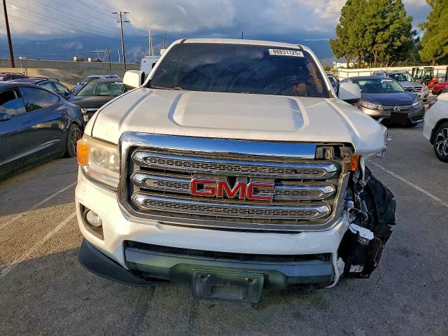 Photo 5 from auction – 2015 GMC CANYON SLE with VIN 1GTG5BEA2F1134217