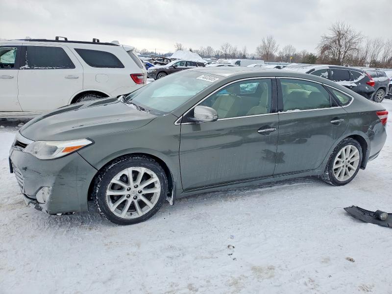 TOYOTA AVALON 2014 with VIN 4T1BK1EB2EU081792 - Photo from auction