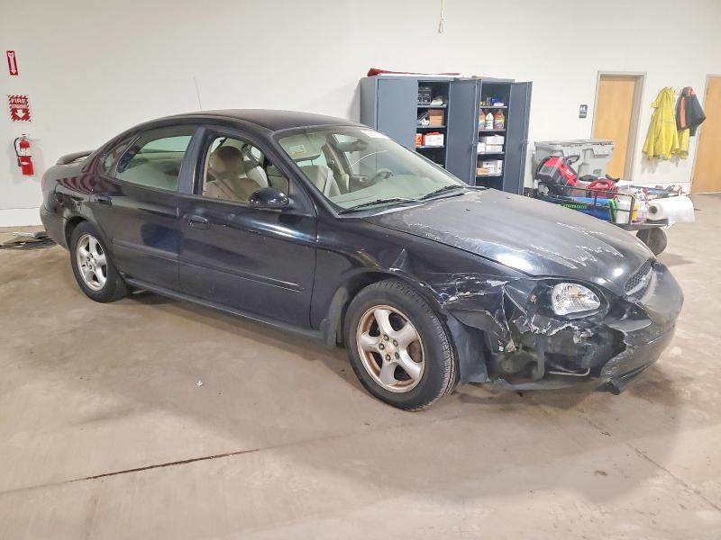 Photo 4 from auction – 2003 FORD TAURUS SE with VIN 1FAFP53U93G229053