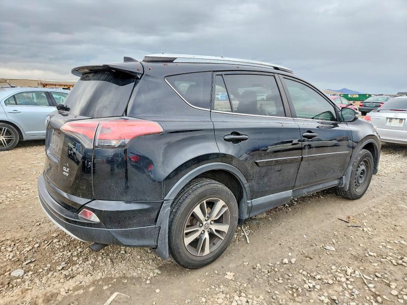 Photo 3 from auction – 2016 TOYOTA RAV4 XLE with VIN 2T3RFREV5GW473378
