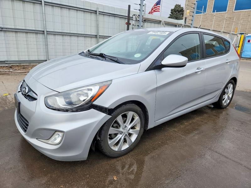 HYUNDAI ACCENT 2012 with VIN KMHCU5AE1CU014085 - Photo from auction