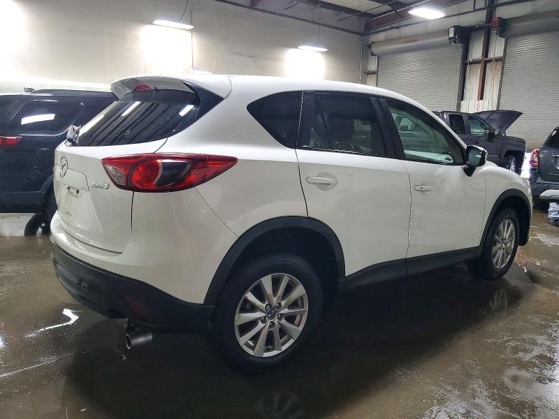 Photo 3 from auction – 2016 MAZDA CX-5 with VIN JM3KE2CY1G0748278