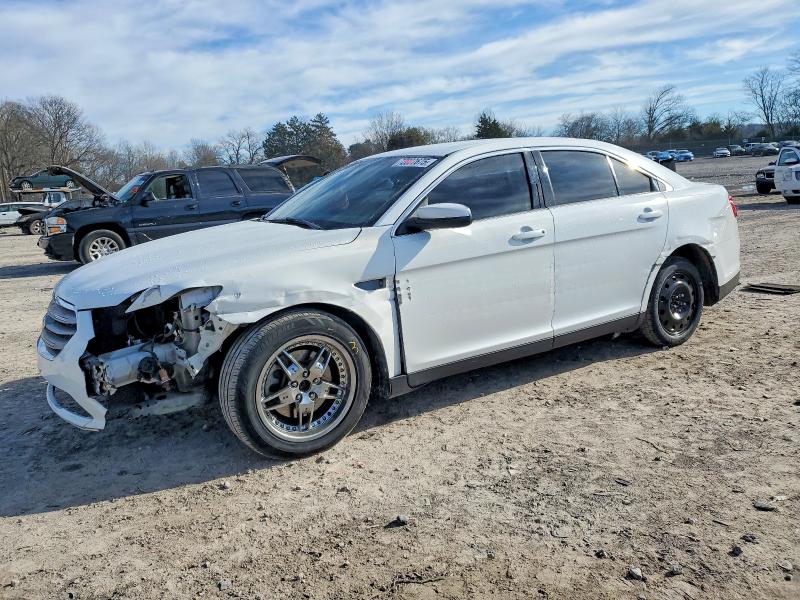 FORD TAURUS SEL 2014 with VIN 1FAHP2H80EG170142 - Photo from auction