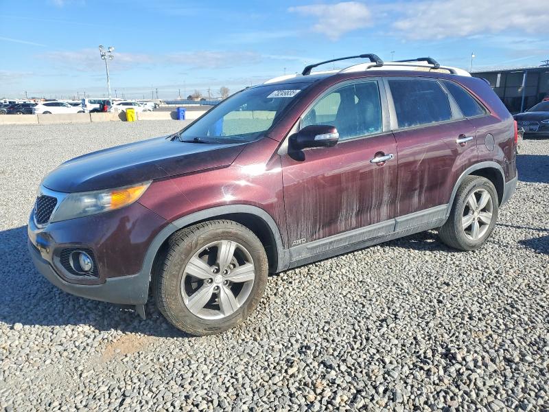 KIA SORENTO EX 2012 with VIN 5XYKUDA21CG200694 - Photo from auction
