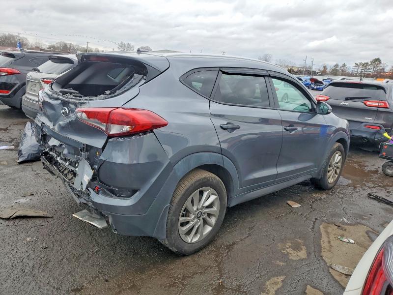 Photo 3 from auction – 2016 HYUNDAI TUCSON LIM with VIN KM8J3CA29GU045014