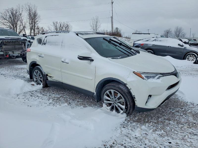 Photo 4 from auction – 2017 TOYOTA RAV4 with VIN JTMDFREV1HJ135311