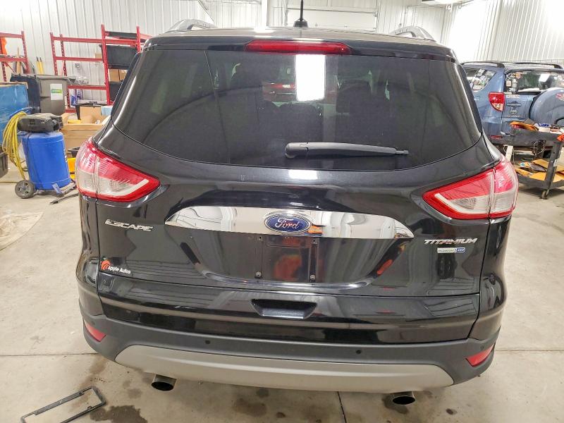 Photo 6 from auction – 2015 FORD ESCAPE TIT with VIN 1FMCU9J90FUB94819
