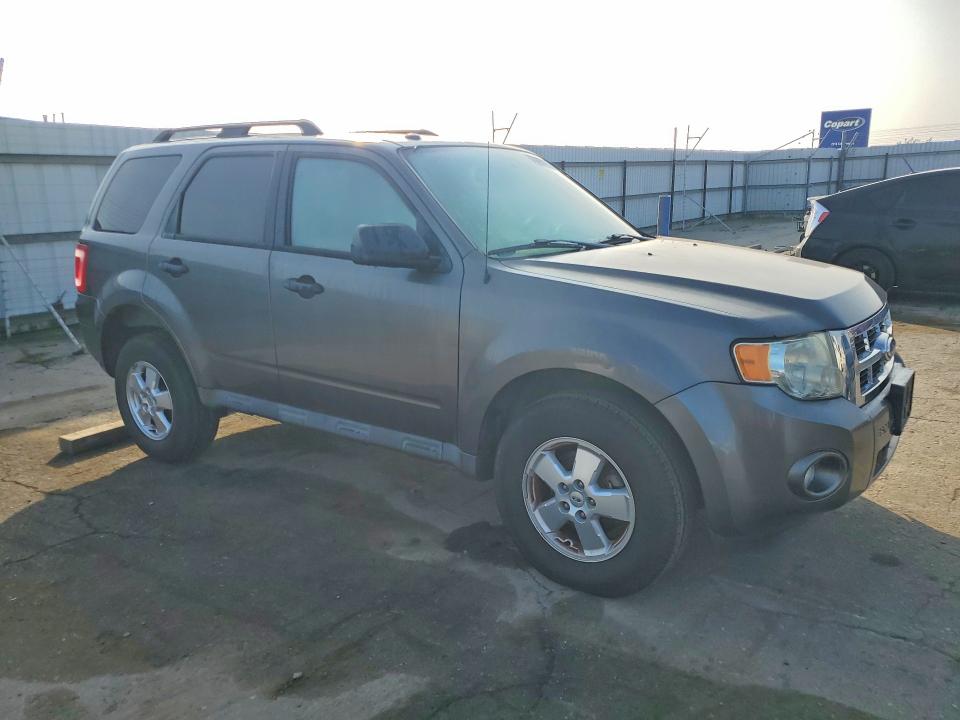 Photo 4 from auction – 2011 FORD ESCAPE XLT with VIN 1FMCU0DG4BKB03949