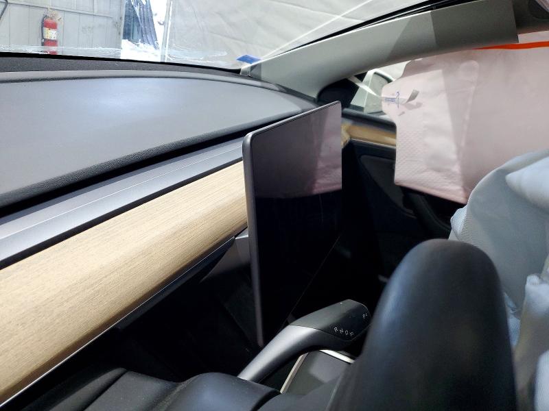 Photo 9 from auction – 2022 TESLA MODEL Y with VIN 7SAYGDEE2NA011942